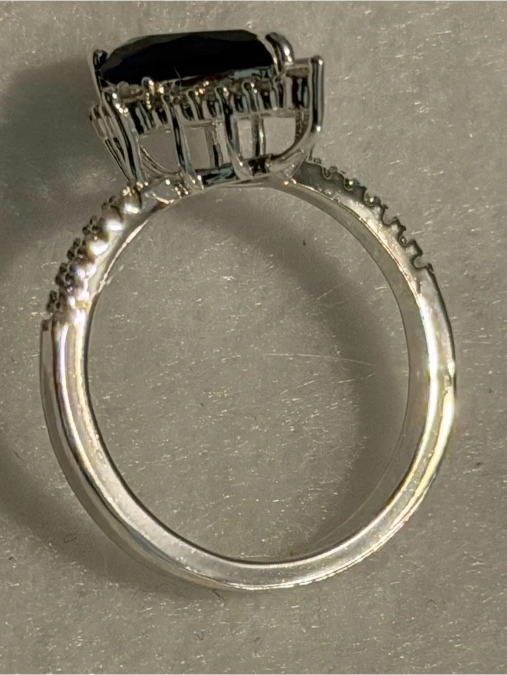Silver Ring with Deep Blue Teardrop Stone and Pavé Accents